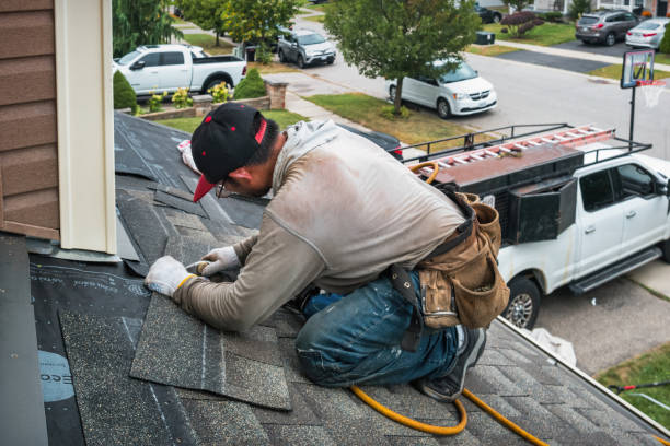 Professional Roofing technician working in Candor, NC